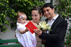 Newly weds with a cute baby girl